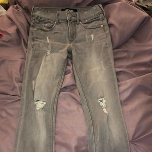 Express jeans with rips.